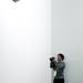 A photographer snaps a picture near the Fiat logo at the North American International Auto Show on Tuesday, Jan. 15. Daniel Brenner I AnnArbor.com
